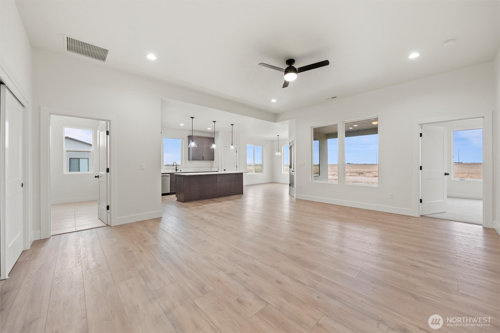 1269 E Mount Othello, WA 99344 - Photo 2 of 32 a view of empty room with wooden floor and window