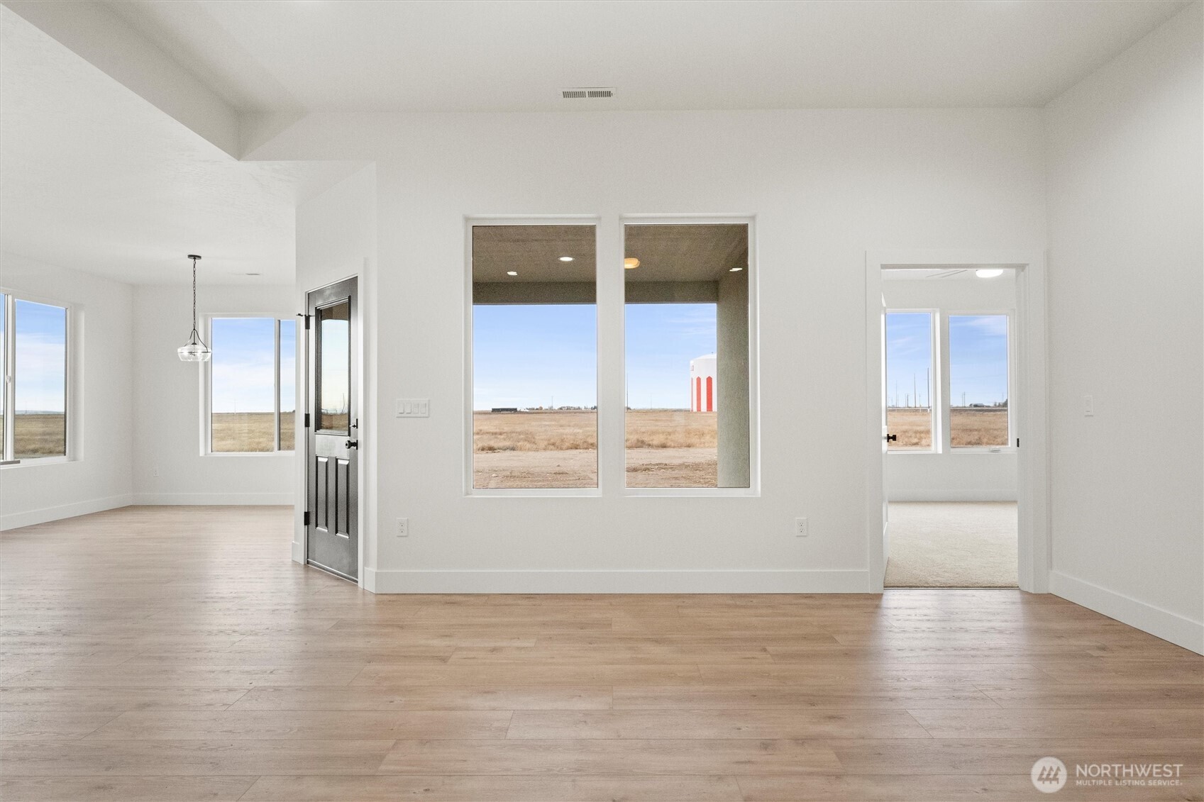 1269 E Mount Othello, WA 99344 - Photo 4 of 32 a view of an empty room with a window