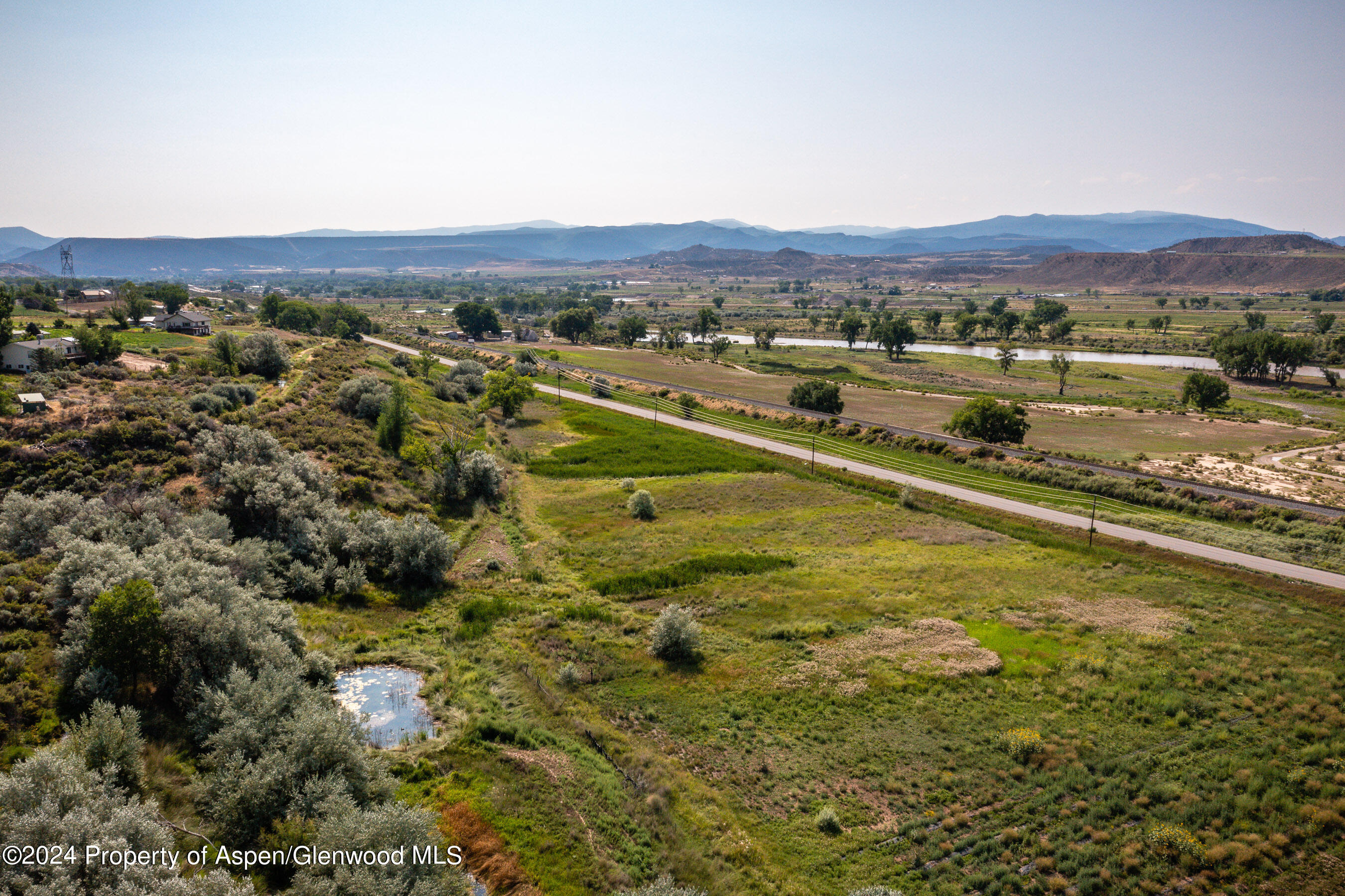 31145 Highway 6 Rifle, CO 81650 - Photo 14 of 25 a view of an aerial view of residential houses with outdoor space and river
