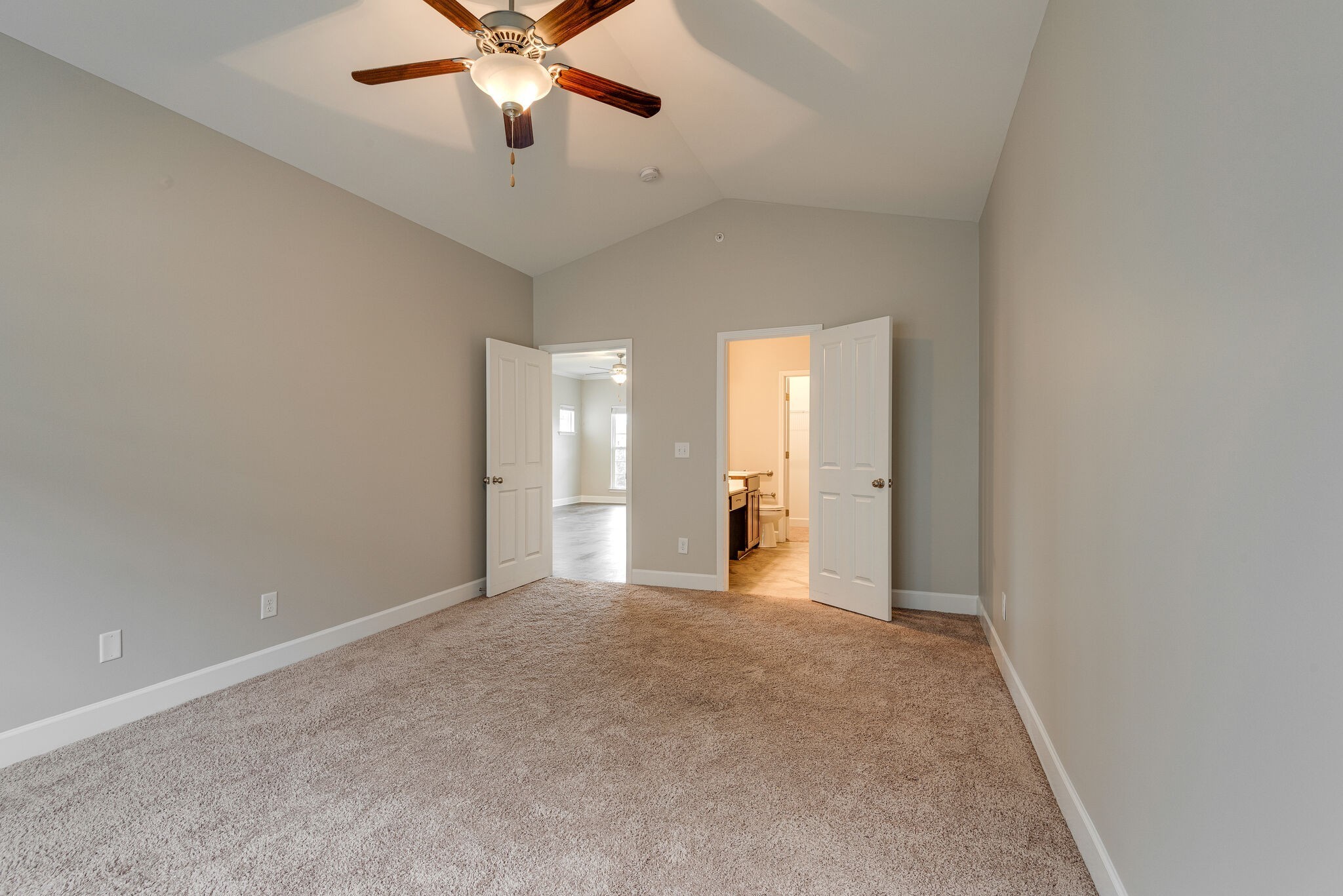 269 Mary Ann Circle Spring Hill, TN 37174 - Photo 14 of 28 wooden floor in an empty room with a ceiling fan