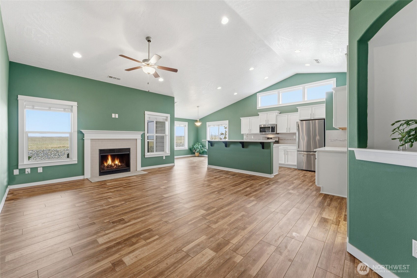 1339 Caprio Loop Walla Walla, WA 99362 - Photo 2 of 26 a view of a kitchen with a sink a kitchen wooden floor and a kitchen