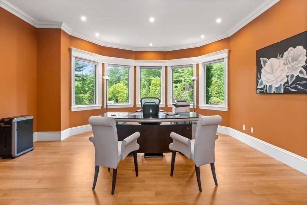19 Ross Lane Middleton, MA 01949 - Photo 15 of 42 a dining room with furniture a large window and wooden floor