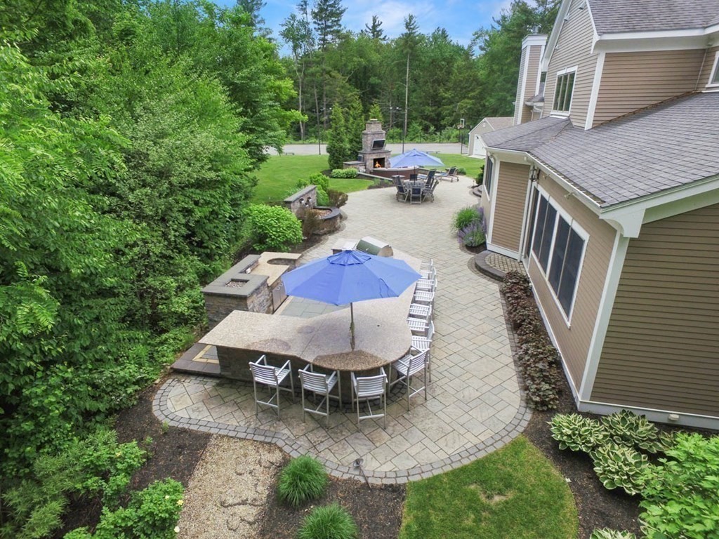 19 Ross Lane Middleton, MA 01949 - Photo 36 of 42 an aerial view of a house with outdoor space patio and mountain view