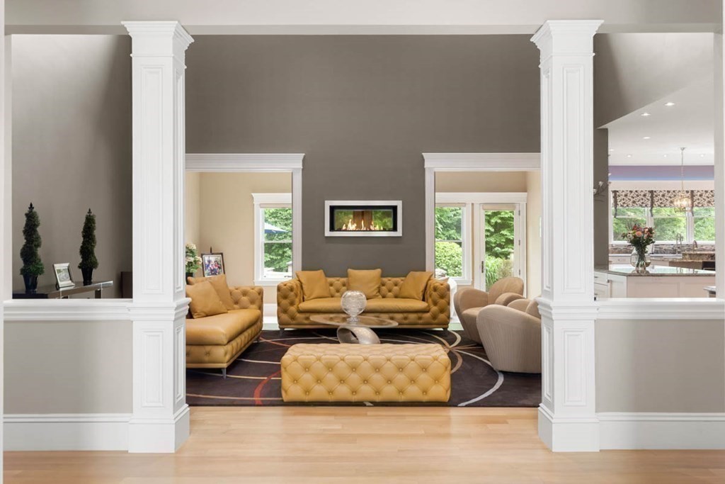 19 Ross Lane Middleton, MA 01949 - Photo 4 of 42 a living room with furniture and a large window