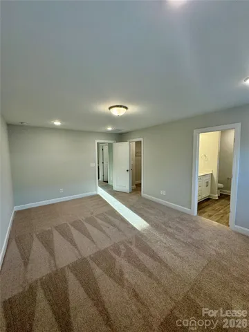 a bathroom with a double vanity sink and mirror
