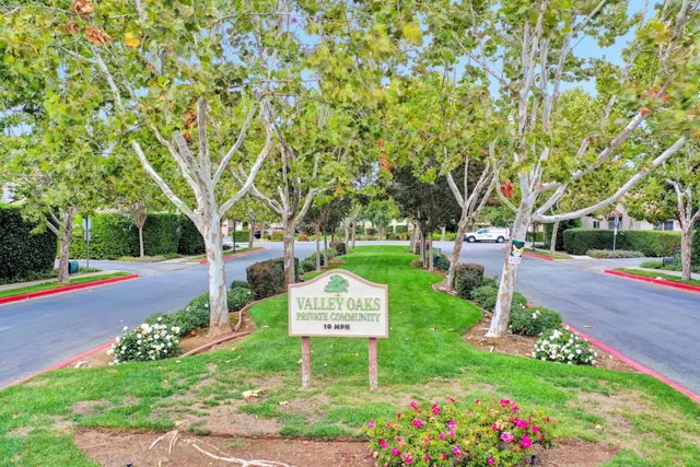 an aerial view of a house with outdoor space