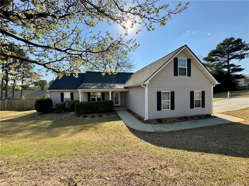 920 Roxeywood Drive Winder, GA 30680 - Photo 1 of 1 a front view of a house with a yard