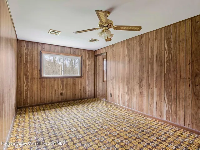 a view of a room with a bathroom