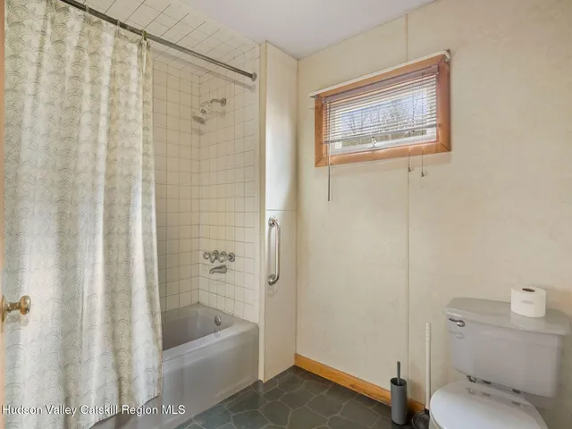 a kitchen with stainless steel appliances granite countertop a refrigerator and a stove