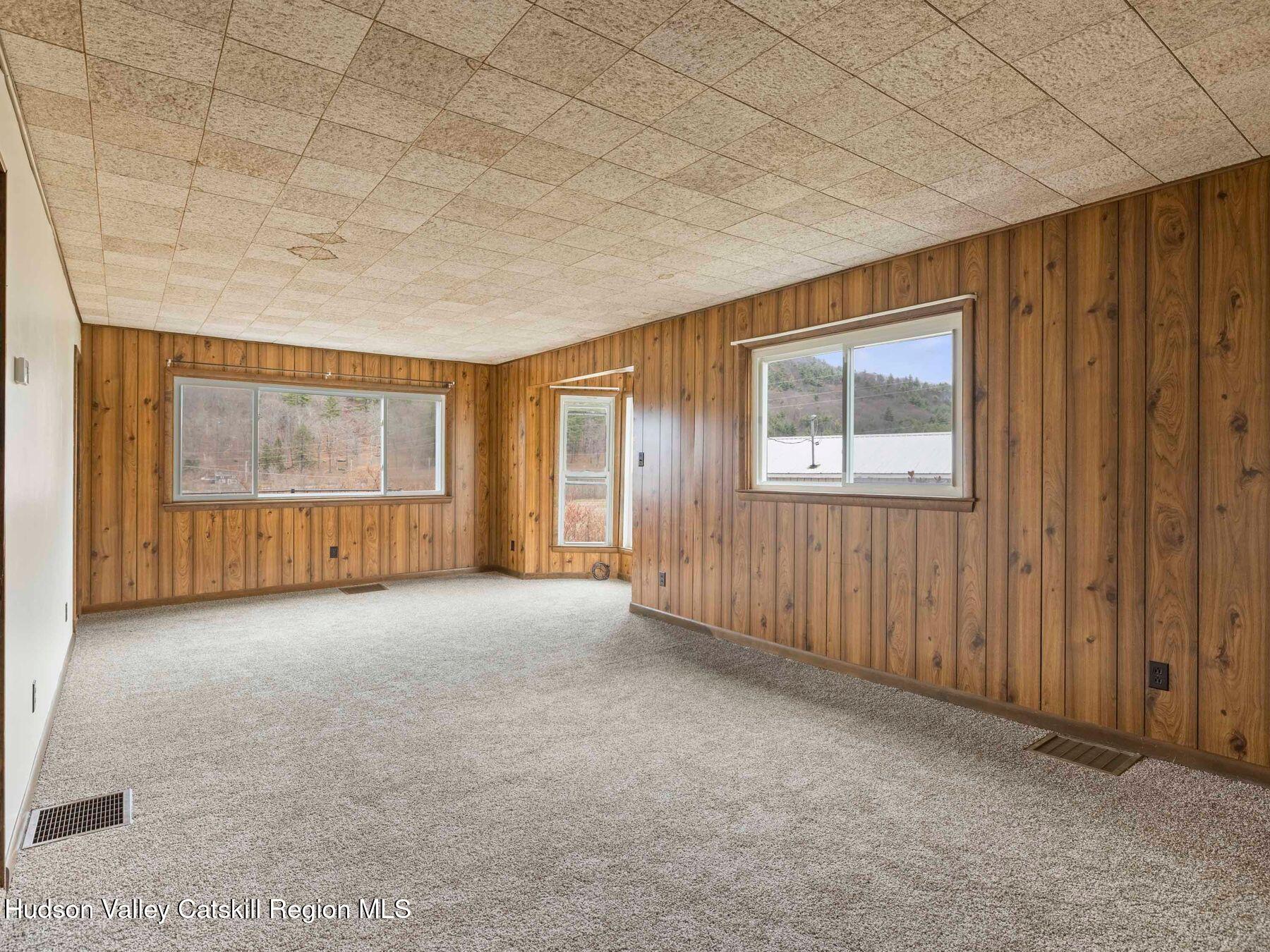 169 Mattice Road Prattsville, NY 12468 - Photo 30 of 52 an empty room with windows