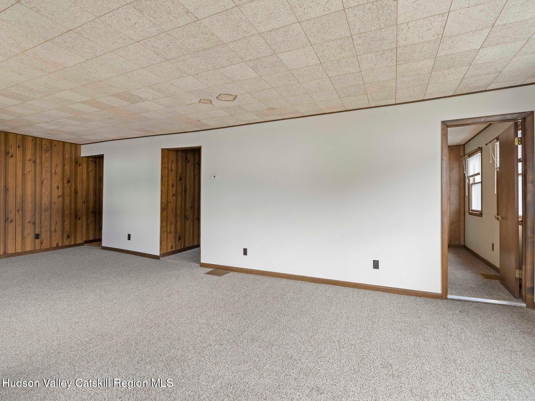 169 Mattice Road Prattsville, NY 12468 - Photo 32 of 52 an empty room with windows