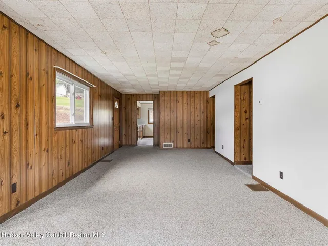 a view of a big room with closet area