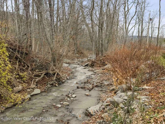 a view of a table and chairs in the yard