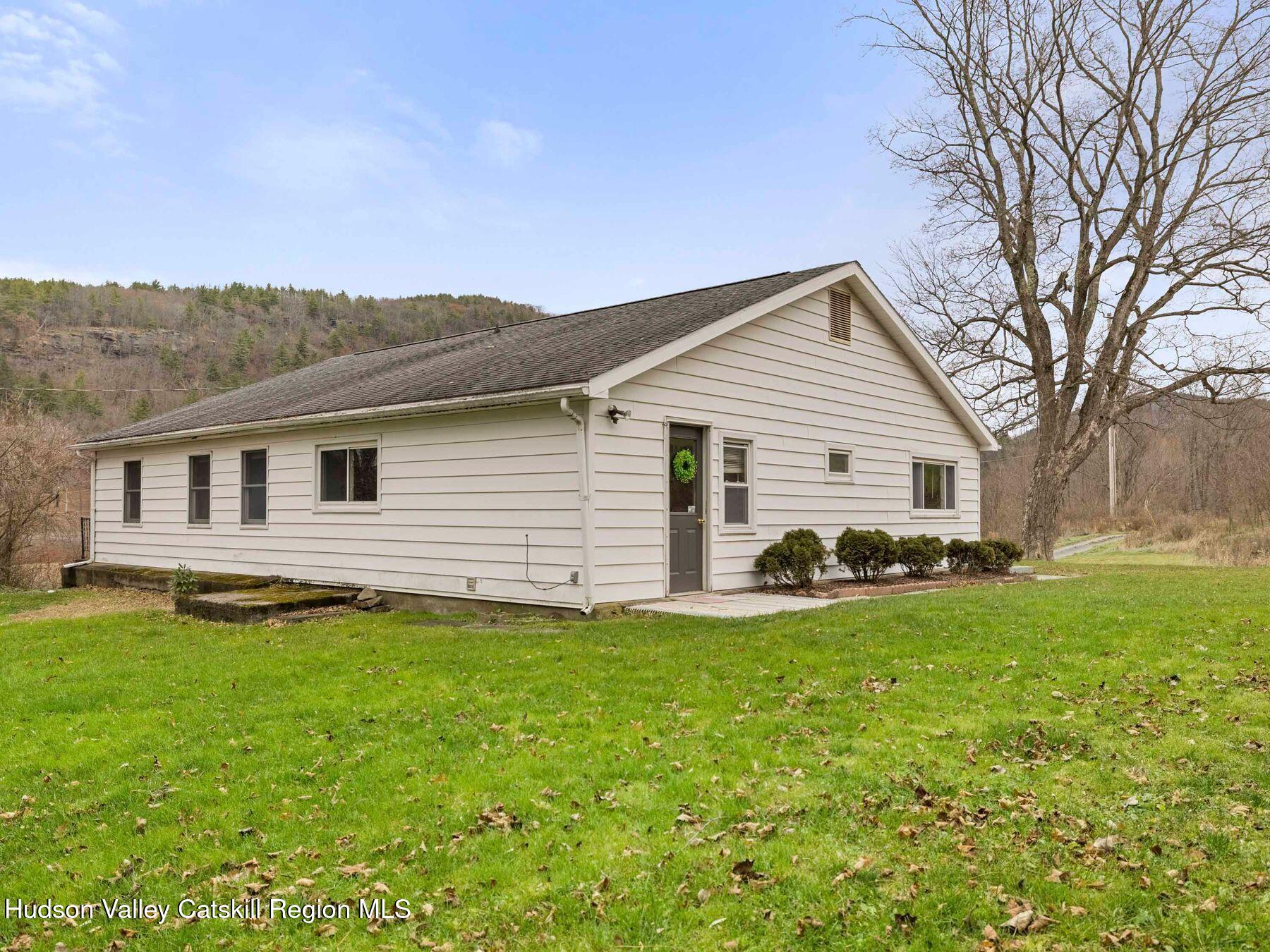 169 Mattice Road Prattsville, NY 12468 - Photo 49 of 52 a front view of house with yard and green space