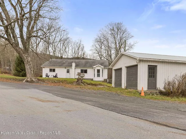 a front view of house with yard