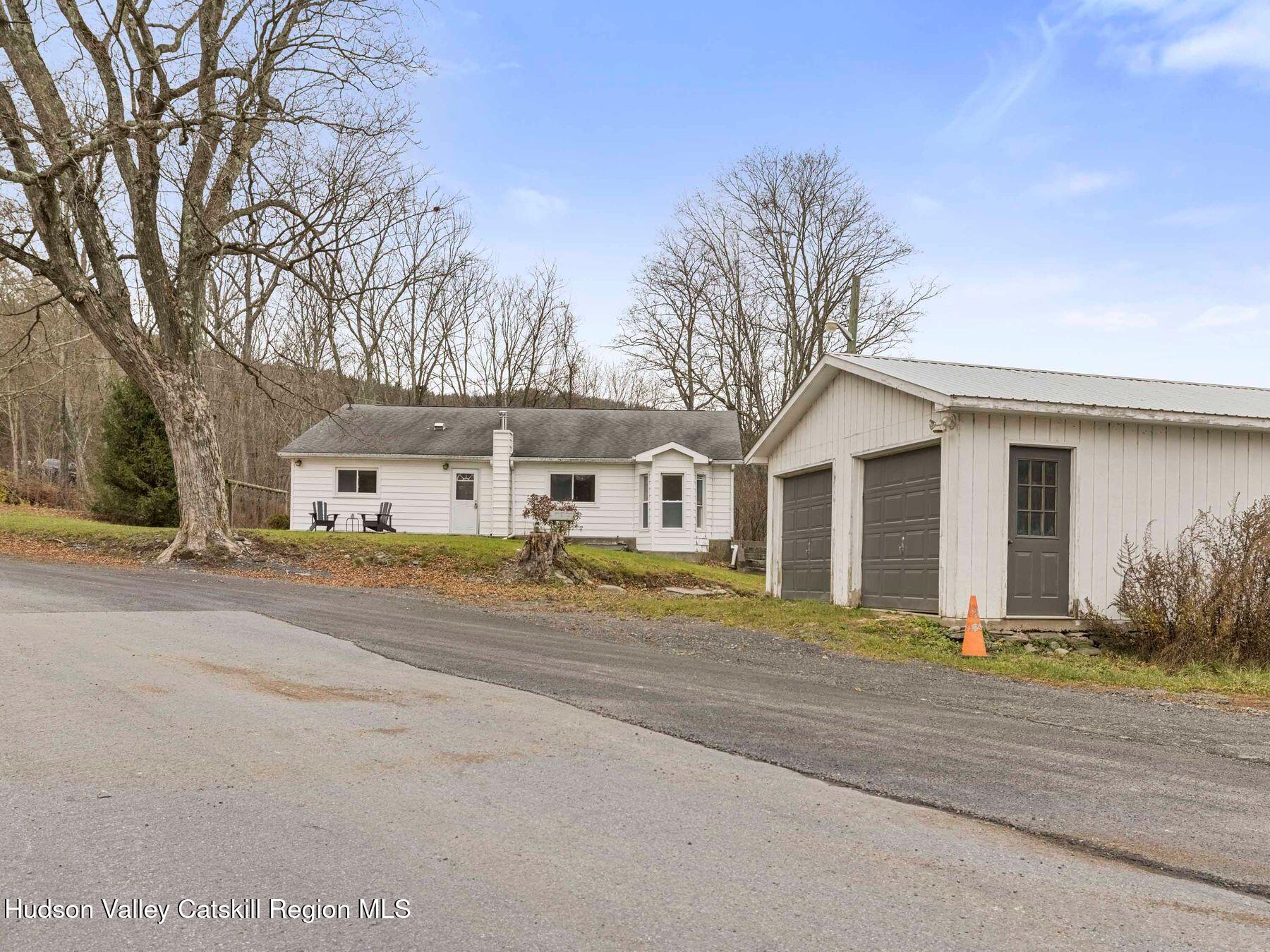 169 Mattice Road Prattsville, NY 12468 - Photo 6 of 52 front view of a house with a street