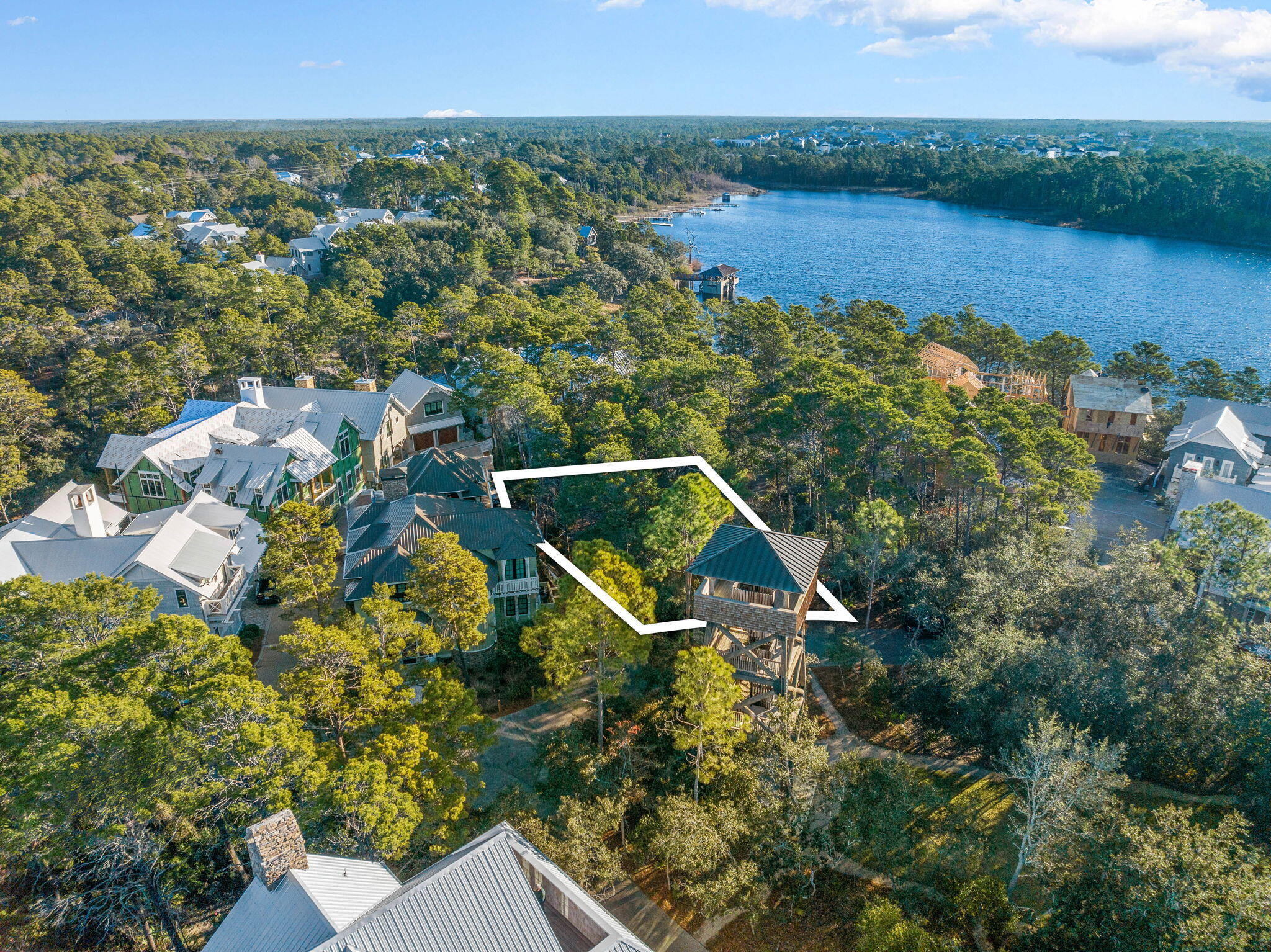 7-6 Cedar Post Road Santa Rosa Beach, FL 32459 - Photo 7 of 37 an aerial view of a house with a garden and lake view