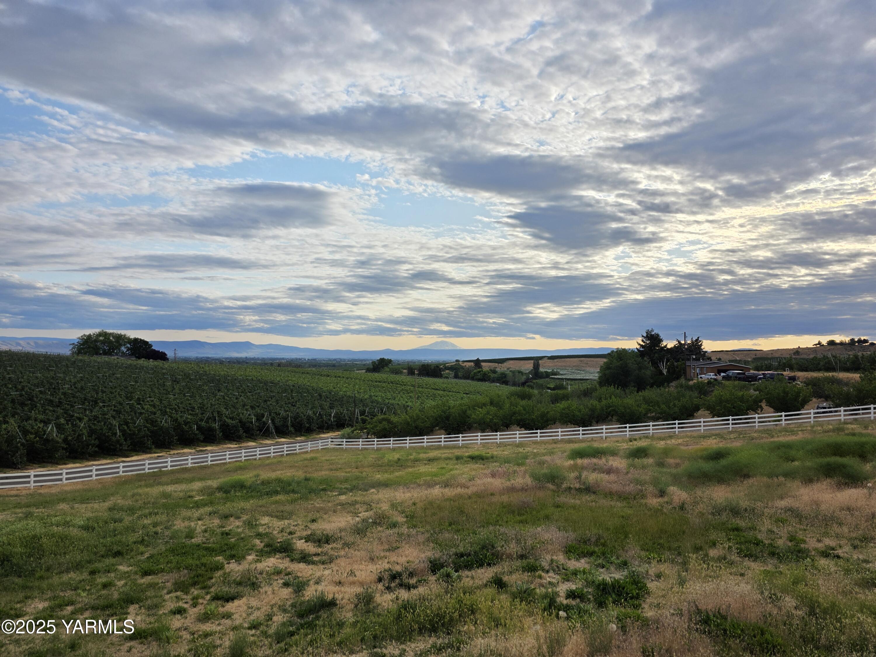 359 Riggins Road Wapato, WA 98951 - Photo 5 of 16 a view of lake with green space