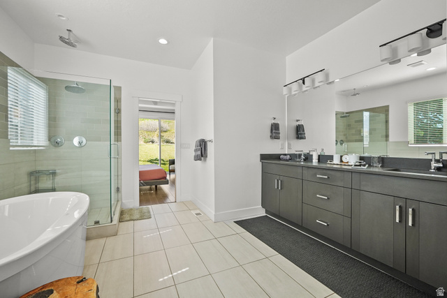 15008 South Springtime Road Draper, UT 84020 - Photo 21 of 37 Full bathroom featuring a stall shower, double vanity, light tile patterned flooring, a freestanding tub, and recessed lighting