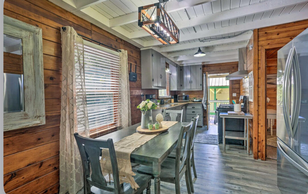 42036 Tollhouse Road Shaver Lake, CA 93664 - Photo 3 of 30 a dining room with furniture and wooden floor