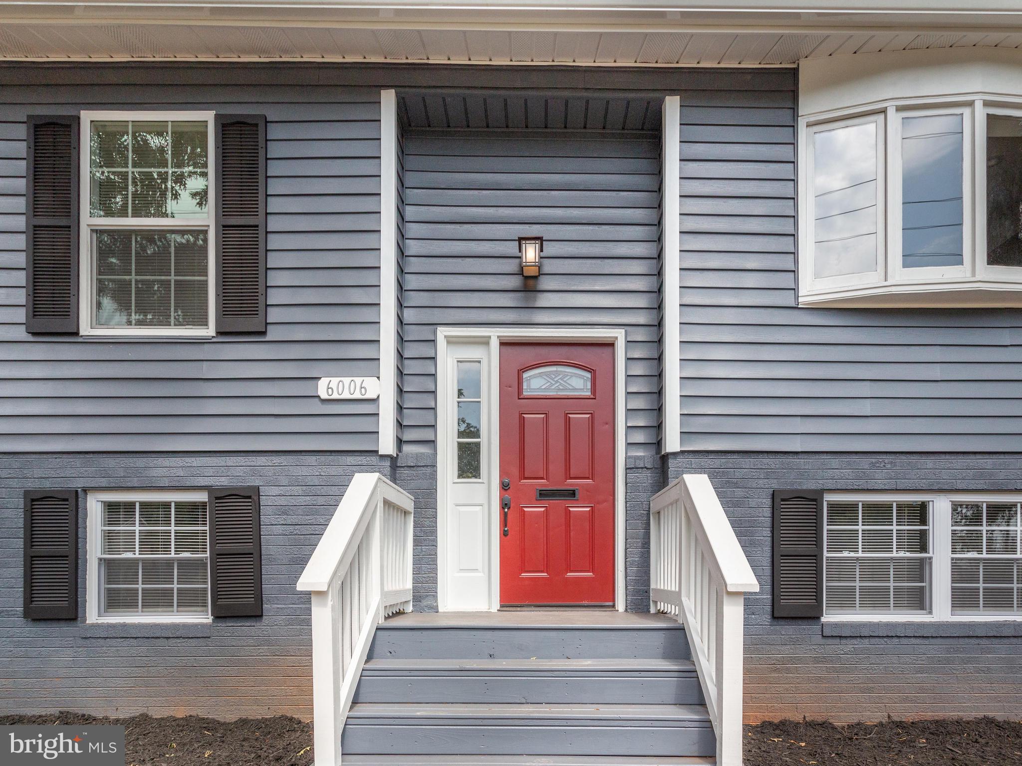 6006 Queens Chapel Road Hyattsville, MD 20782 - Photo 1 of 19 a front view of a house with a porch