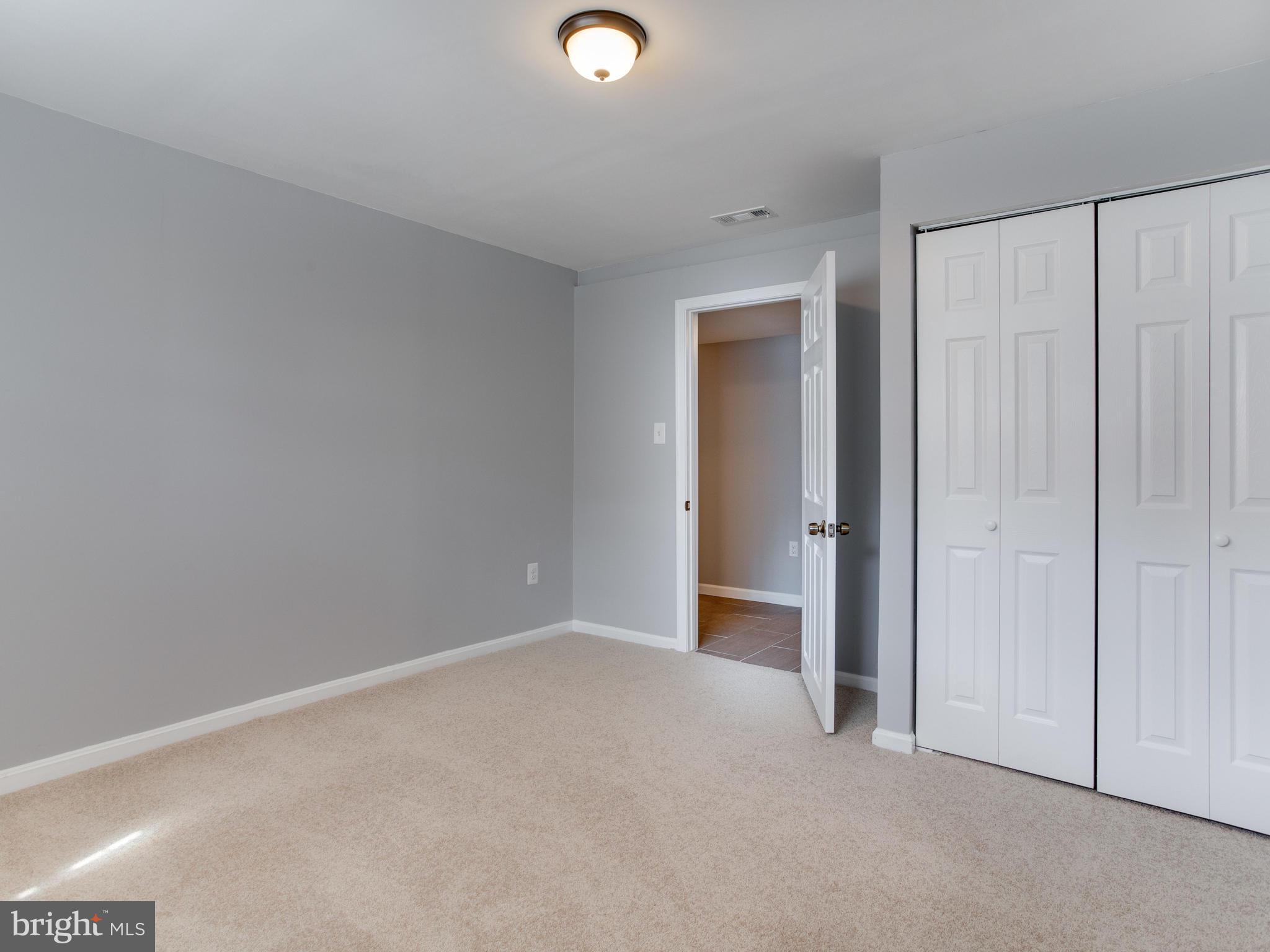 6006 Queens Chapel Road Hyattsville, MD 20782 - Photo 13 of 19 a view of an empty room and closet area