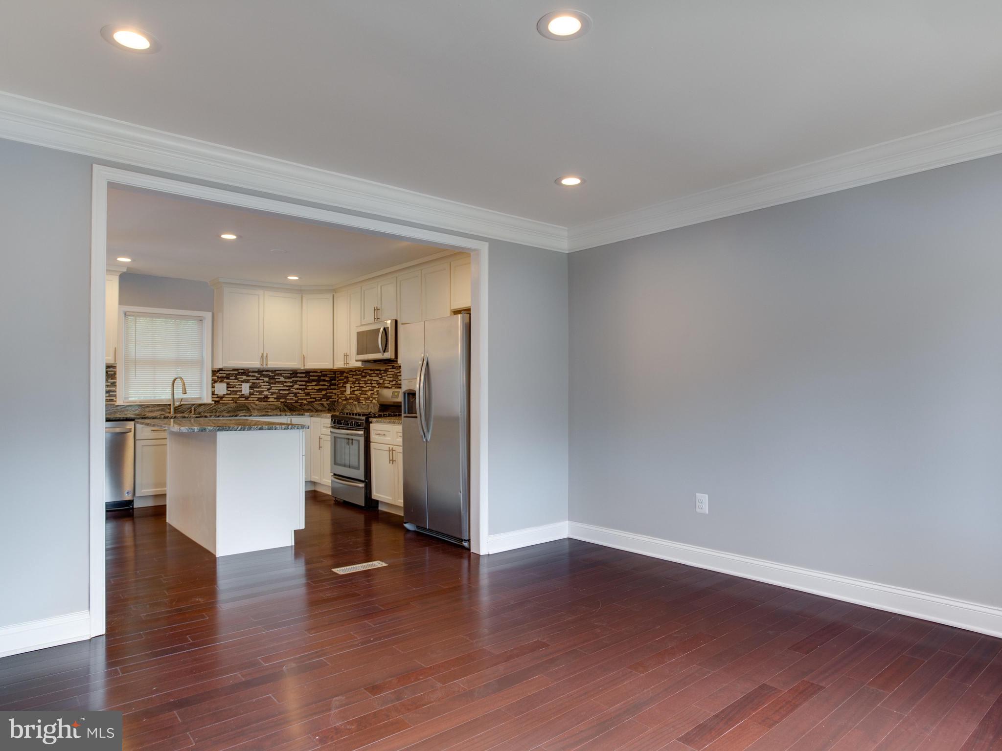 6006 Queens Chapel Road Hyattsville, MD 20782 - Photo 3 of 19 a view of kitchen with wooden floor