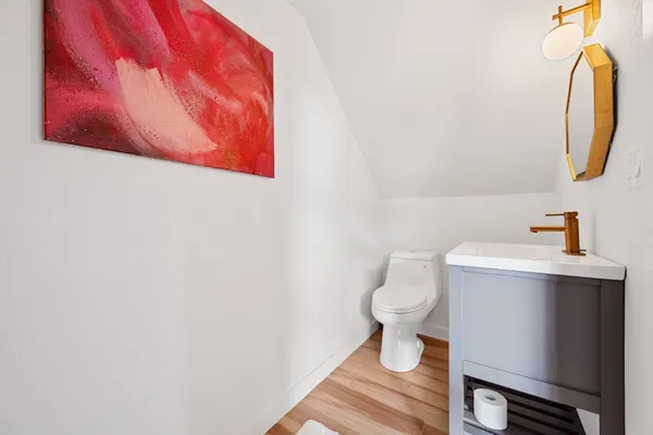 a bathroom with a toilet and a sink
