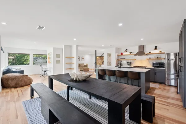 a living room with furniture and a table