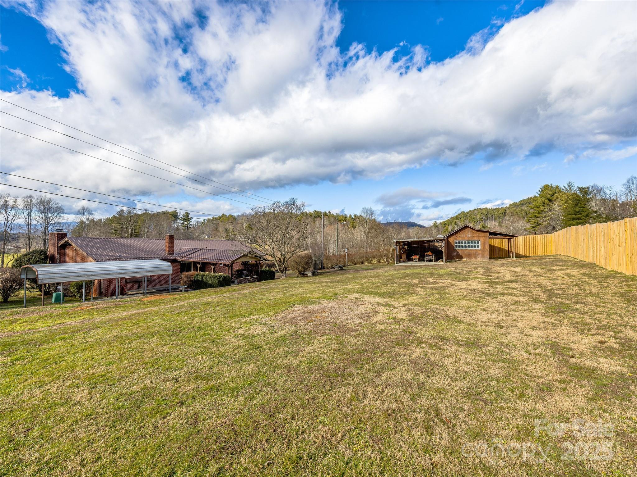 372 Hamilton Road Penrose, NC 28766 - Photo 25 of 38 a view of a lake with houses
