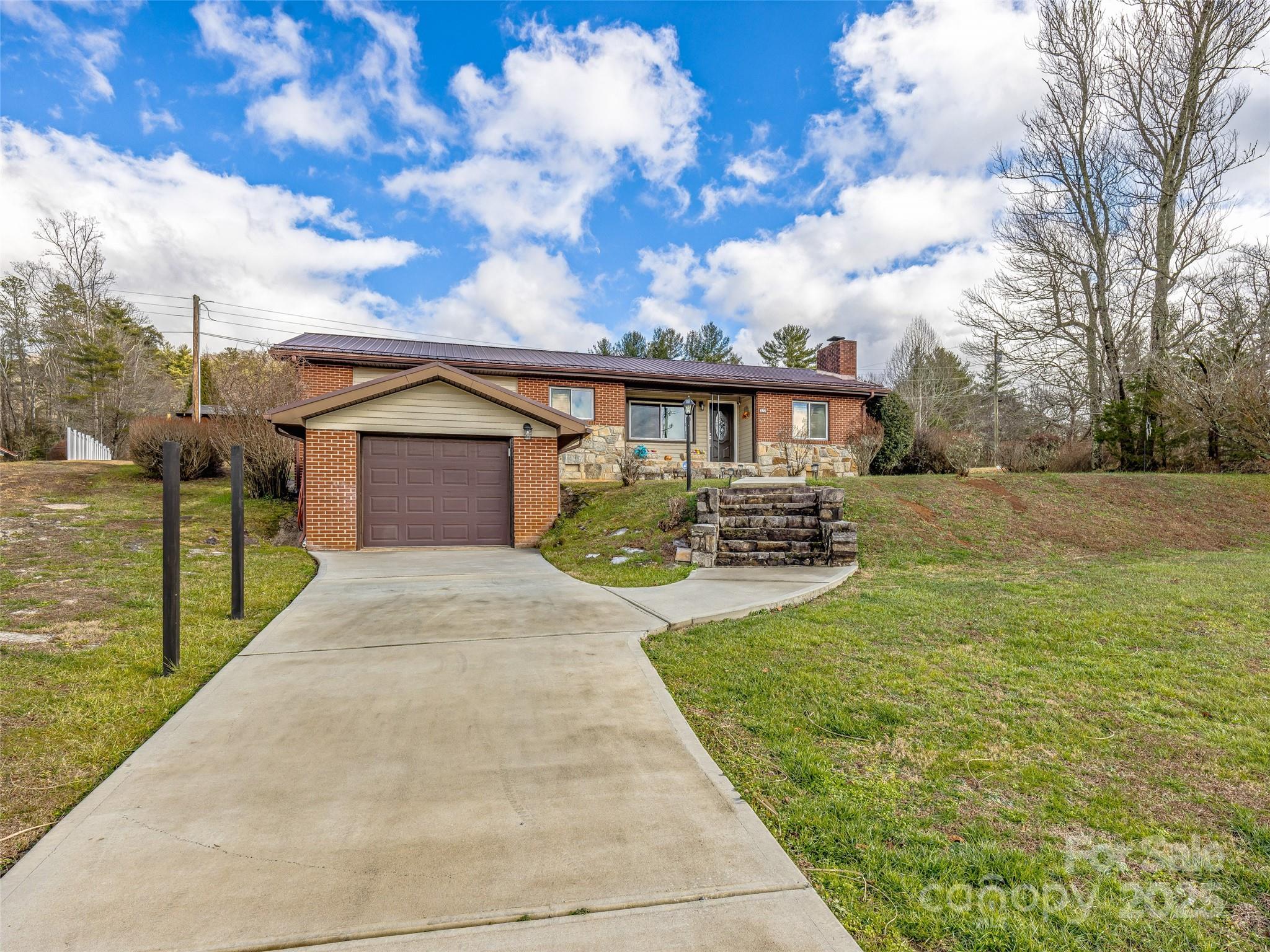 372 Hamilton Road Penrose, NC 28766 - Photo 4 of 38 a view of house with outdoor space and swimming pool