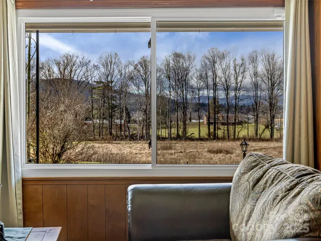 a view of a living room and a window