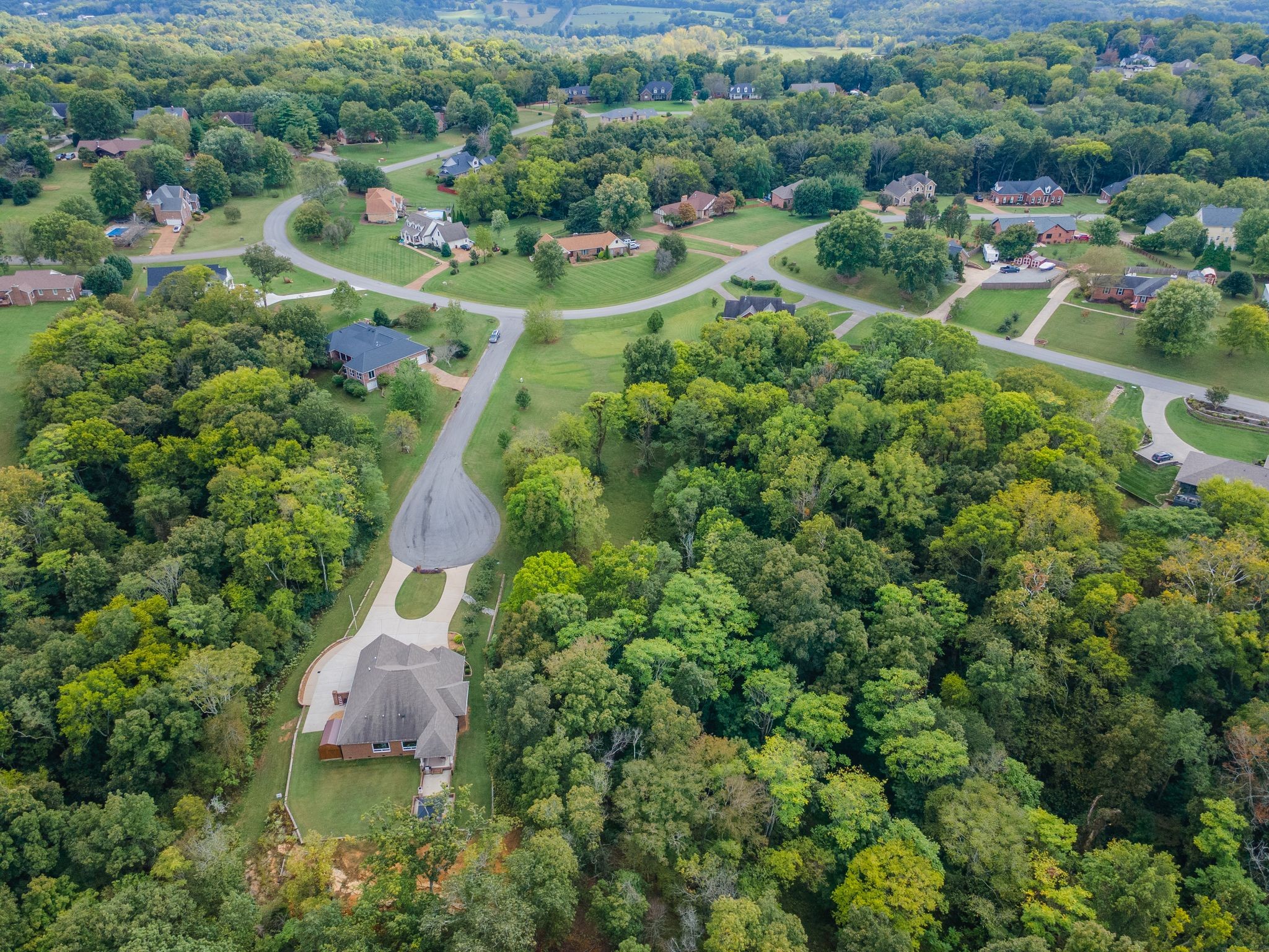 1202 Valarie Lane Columbia, TN 38401 - Photo 15 of 18 an aerial view of residential house with outdoor space and trees all around