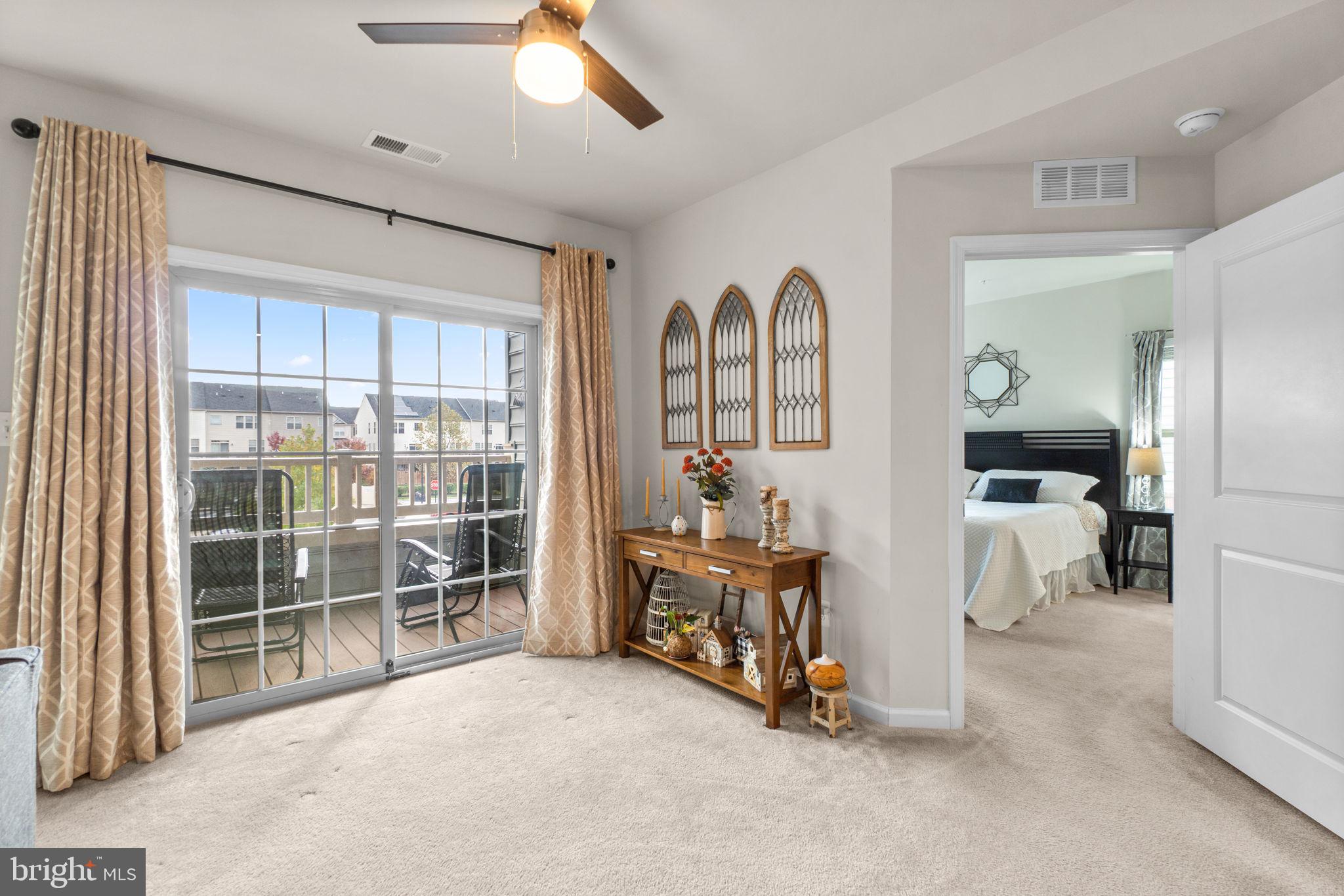 4861 Finnical Way, Unit 203 Frederick, MD 21703 - Photo 8 of 32 Living Room Area