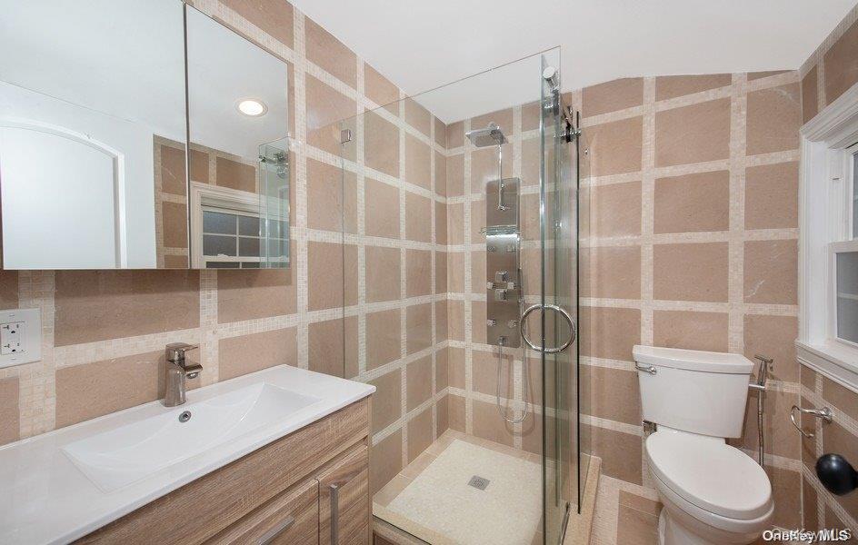 9 Tower Hill Road Shoreham, NY 11786 - Photo 18 of 41 Bath, single sink vanity, stall shower glass door entry
