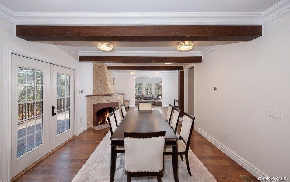 9 Tower Hill Road Shoreham, NY 11786 - Photo 6 of 41 Formal Diing Room with French doors to deck with another fireplace