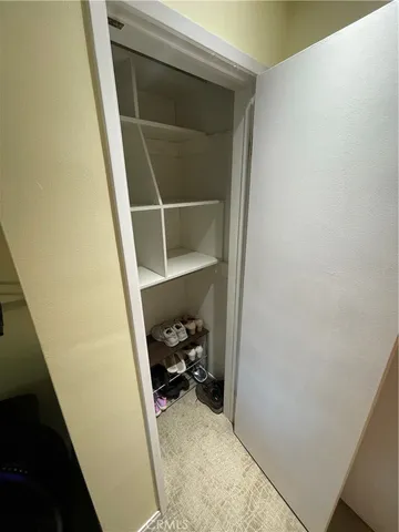 a view of storage and utility room with a sink