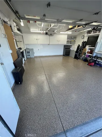 a view of gym equipment and a garage