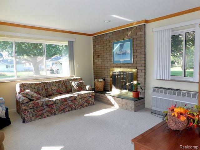 15325 Wick Road Allen Park, MI 48101 - Photo 26 of 45 FAMILY ROOM AREA WITH LOTS OF WINDOWS OVERLOOKING BACKYARD!