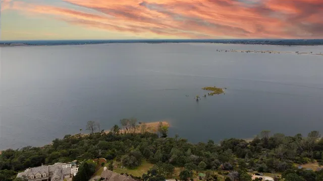 a view of a lake and mountain in back