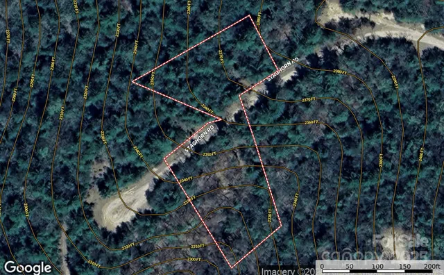 a backyard of a house with yard and outdoor seating