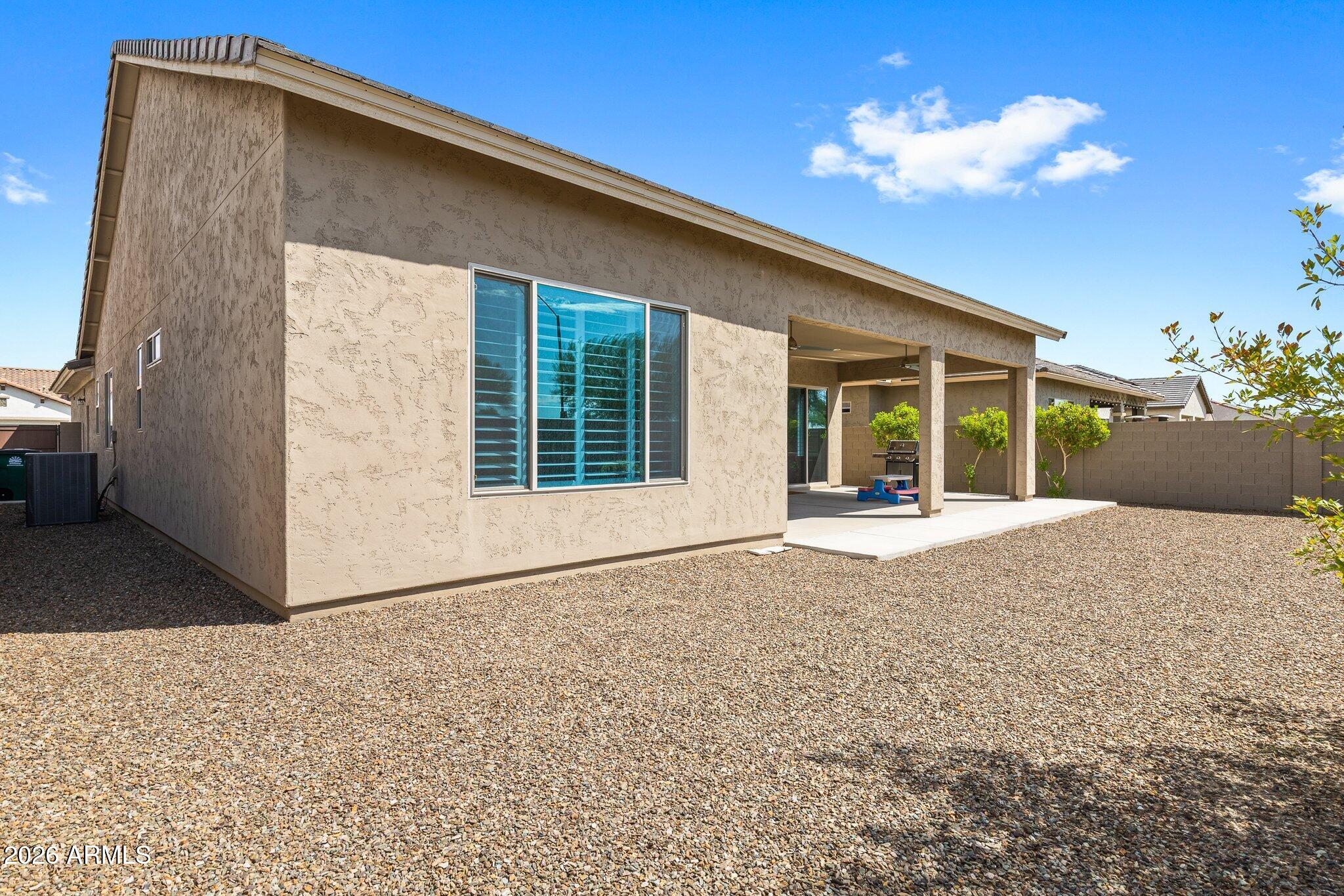 16897 West Almeria Road Goodyear, AZ 85395 - Photo 38 of 51 Low-Maintenance Backyard