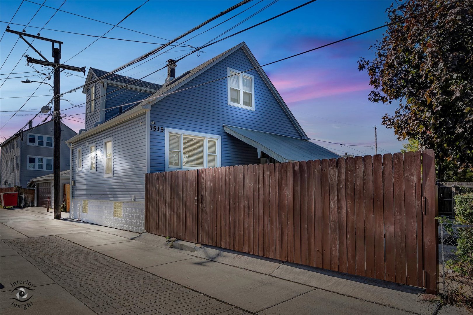 a view of a house with a garage