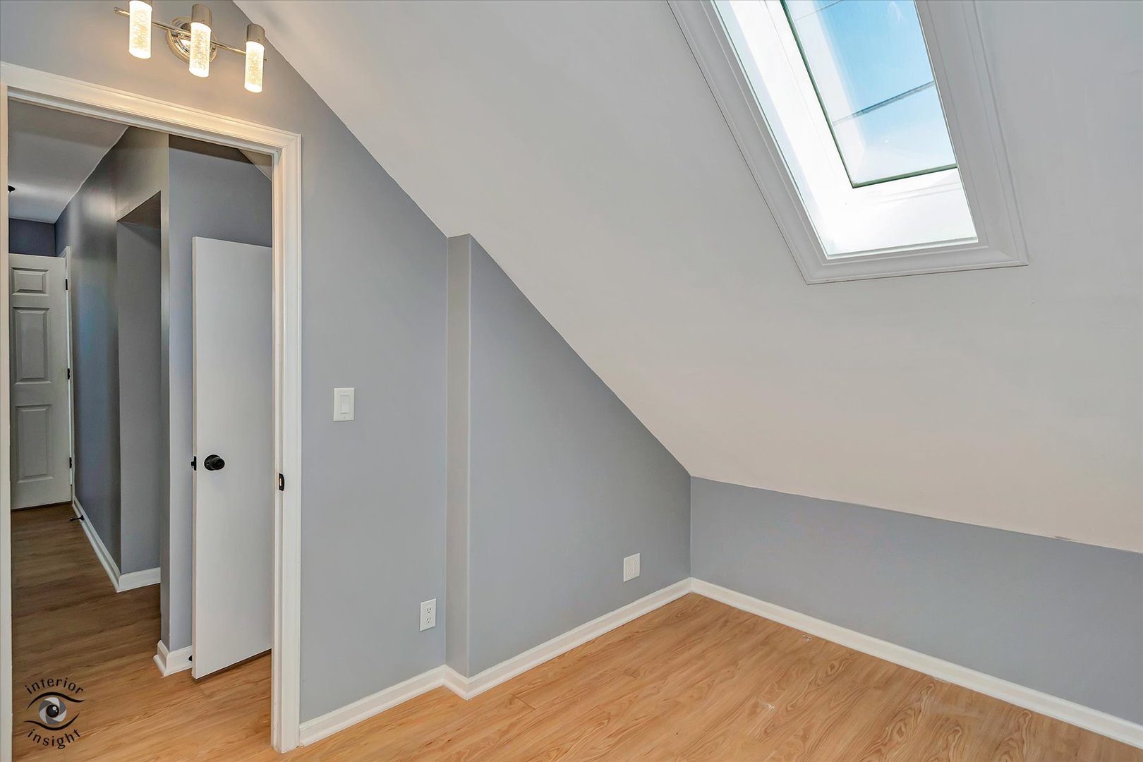 7515 West 61st Street Summit, IL 60501 - Photo 23 of 32 an empty room with wooden floor and entrance