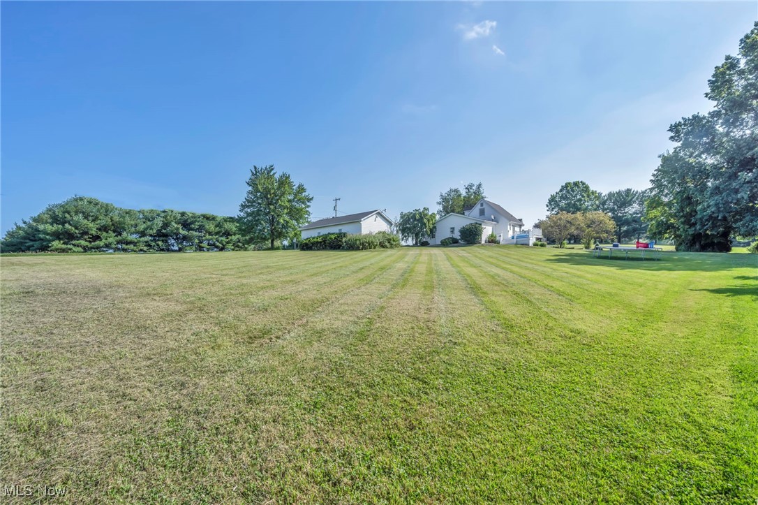 9827 Akron Road Rittman, OH 44270 - Photo 42 of 47 View of grassy yard