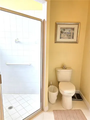 a en suite bathroom with a sink and a mirror