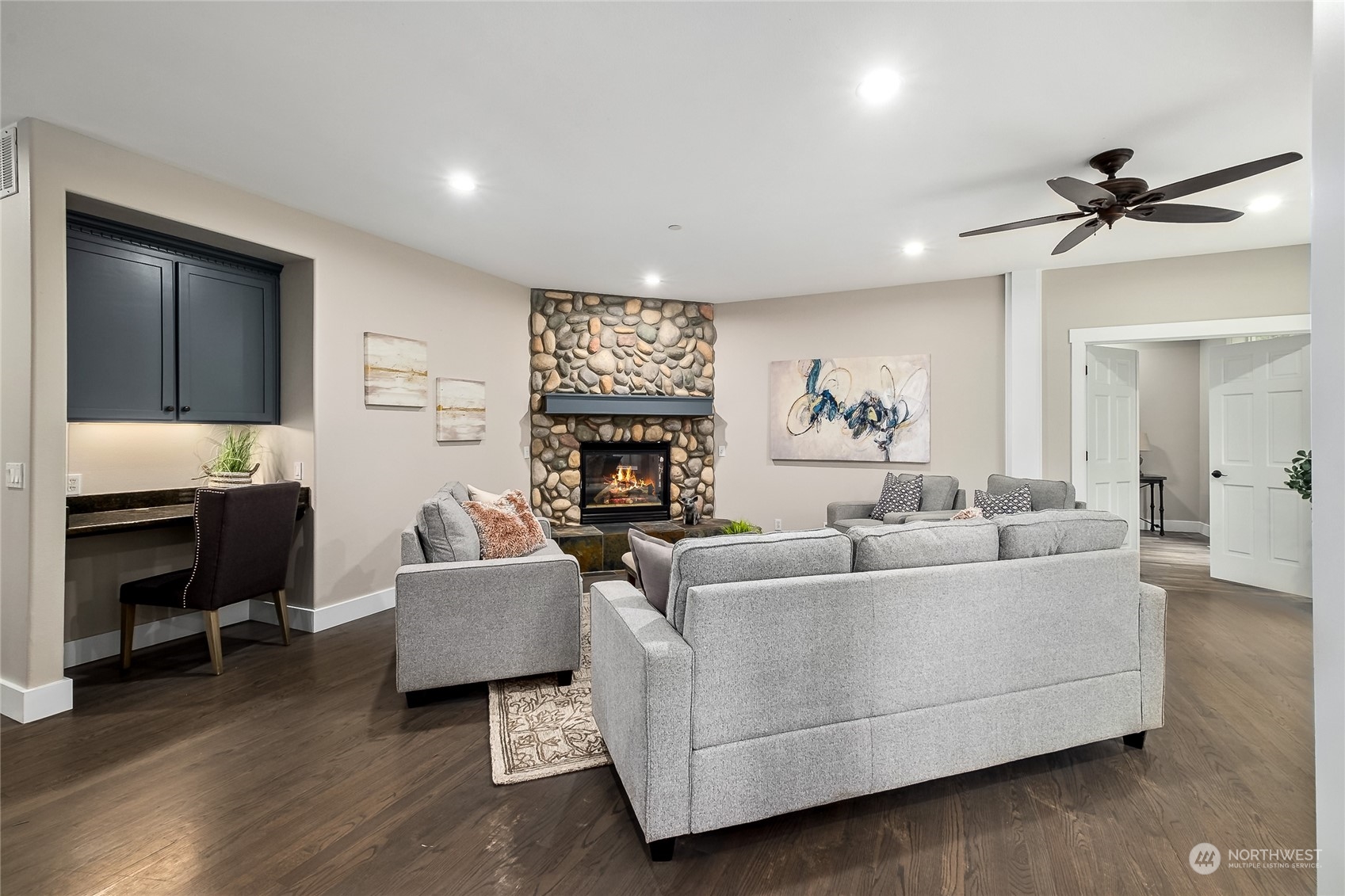 24827 247th Place Southeast Maple Valley, WA 98038 - Photo 12 of 33 a living room with furniture and a flat screen tv