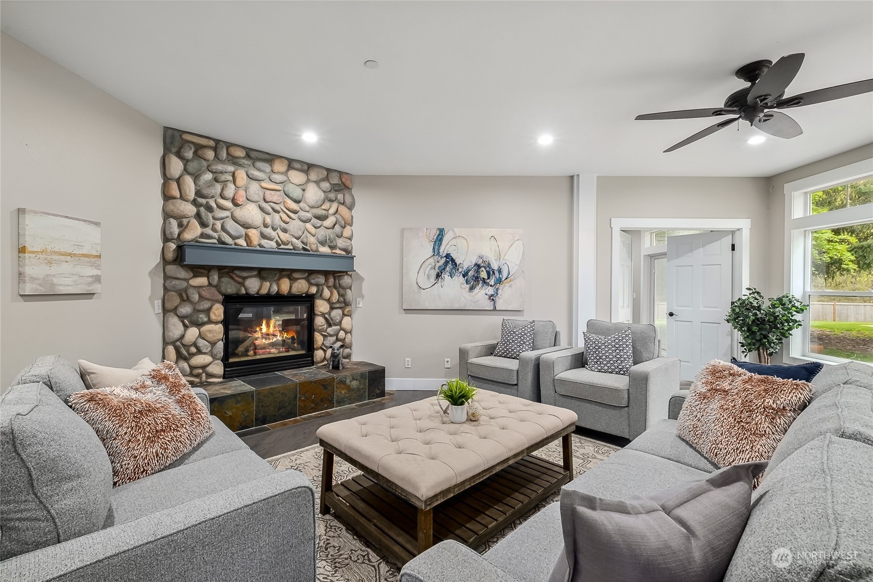 24827 247th Place Southeast Maple Valley, WA 98038 - Photo 13 of 33 a living room with furniture and a fireplace