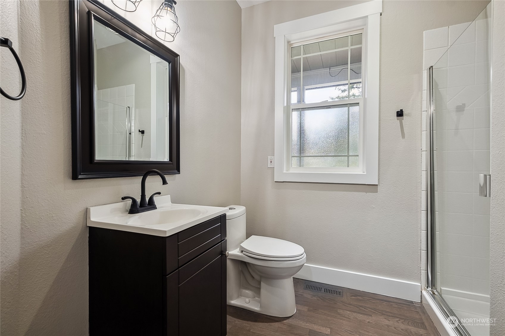 24827 247th Place Southeast Maple Valley, WA 98038 - Photo 18 of 33 a bathroom with a toilet sink and mirror