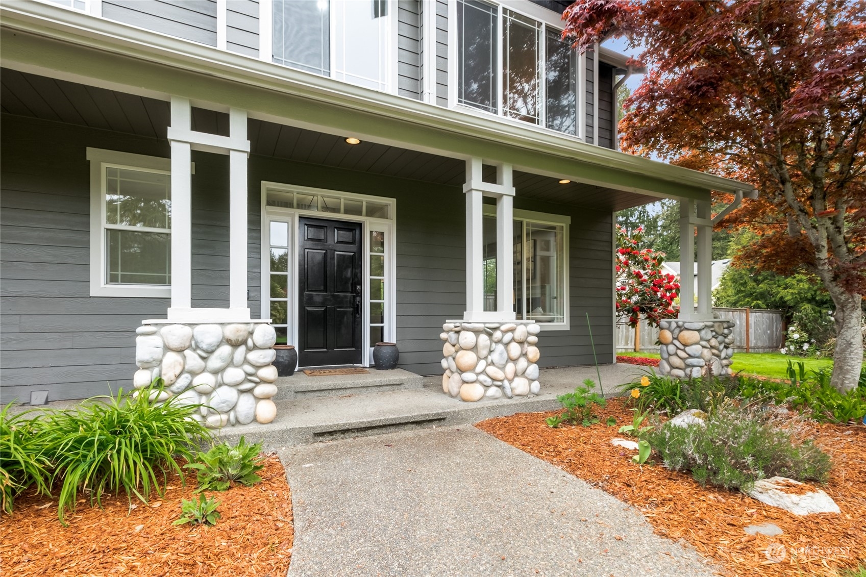 24827 247th Place Southeast Maple Valley, WA 98038 - Photo 2 of 33 a front view of a house
